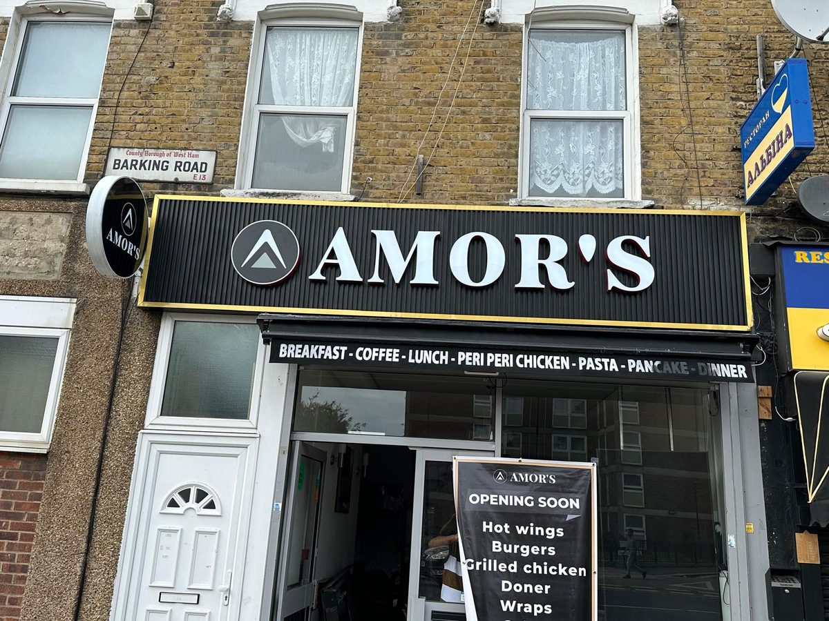 Amor's shopfront sign made and fitted by Sign & Print