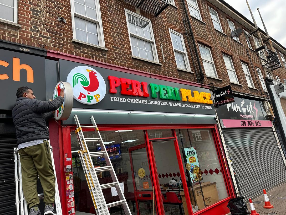Peri Peri Place shopfront sign made and fitted by Sign & Print